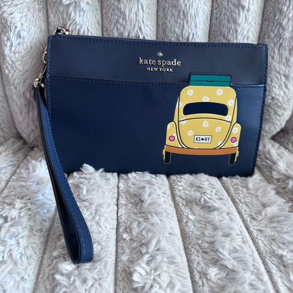 kate spade Handbags - Kate Spade Blue Beep Beep Wristlet Design